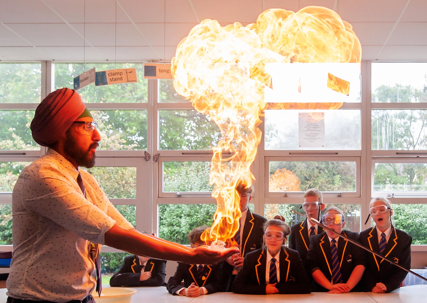 School website photography of methane bubble demonstration in the classroom